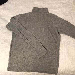 Tight grey turtleneck